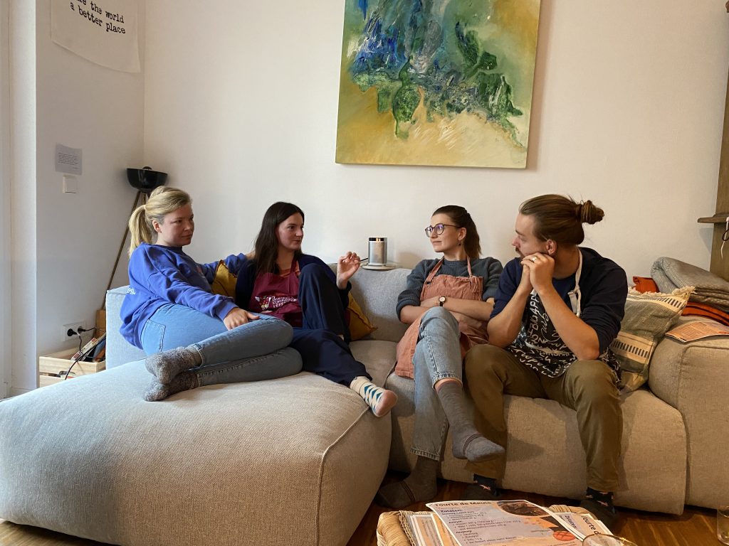 Participants discuss while the bread is baking